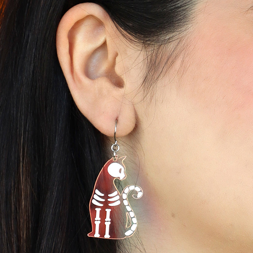 erstwilder bone kitty drop earrings halloween iridescent