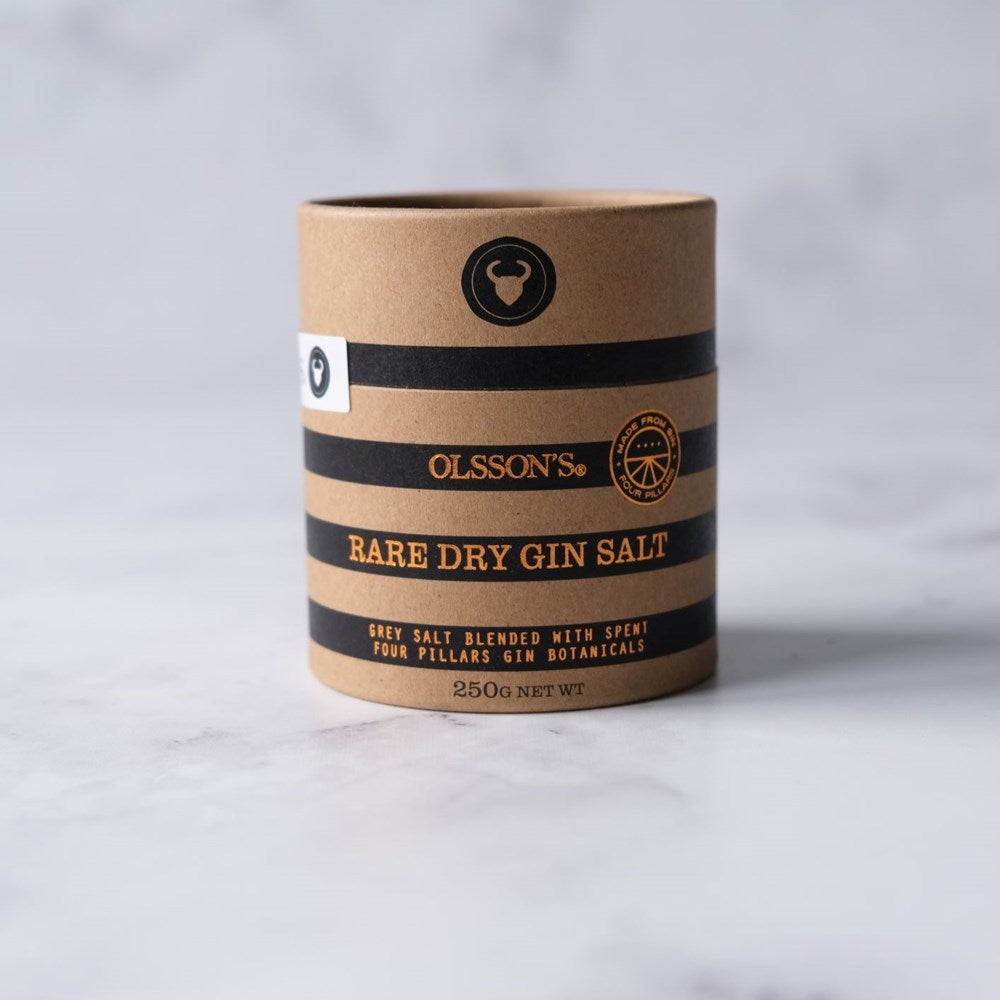 Kraft paper container with Olsson's Rare Dry Gin Salt on a white background