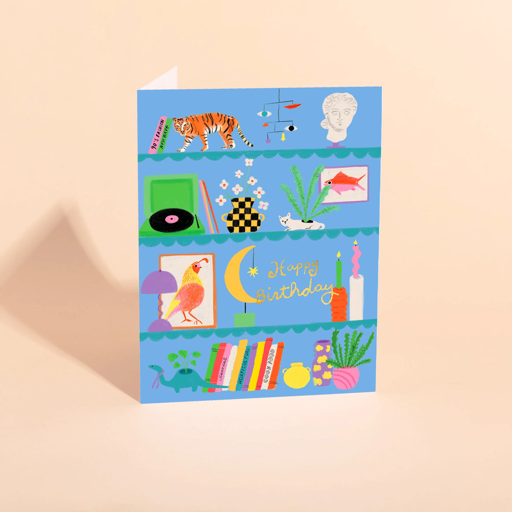 Colorful birthday card with various illustrations on a beige background carolyn suzuki perfect corner